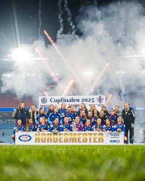 Players of Vålerenga celebrates with the trophy