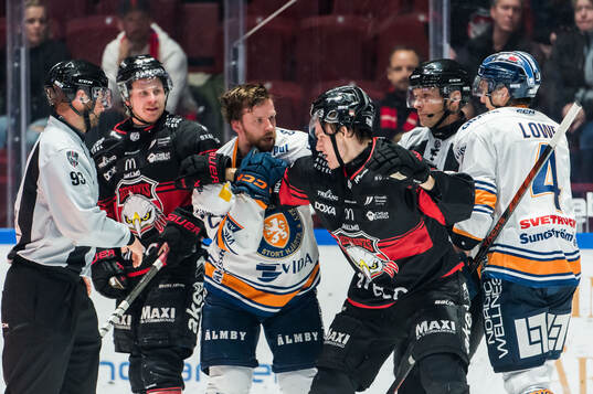 Växjös Brian Cooper och Malmö Redhawks Martin Schreiber