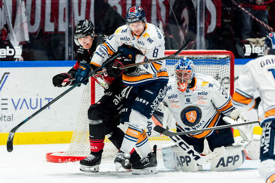Malmö Redhawks Fredrik Händemark och Växjös Zachary
