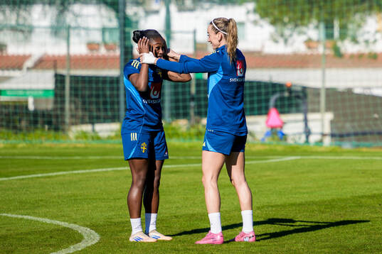 Monica Jusu Bah and Kosovare Asllani of the women's