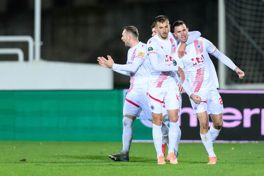 Mario Cuže of Zrinjski Mostar celebrate with teammates