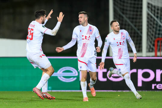 Mario Cuže of Zrinjski Mostar celebrate with teammates