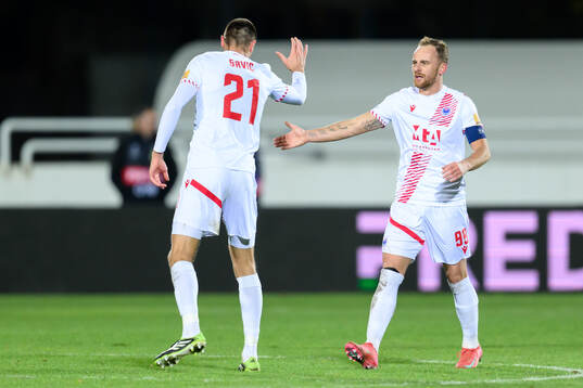Nemanja Bilbija of Zrinjski Mostar celebrate with Igor