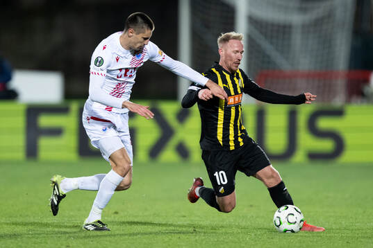 Igor Savic of Zrinjski Mostar and Mikkel Rygaard Jensen of