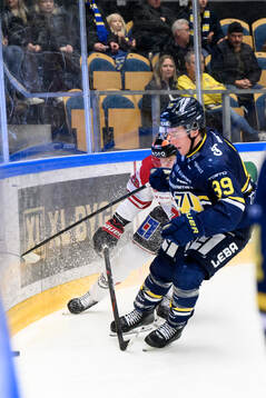 Örebros Milton Oscarson och HV71s Jamiro Reber