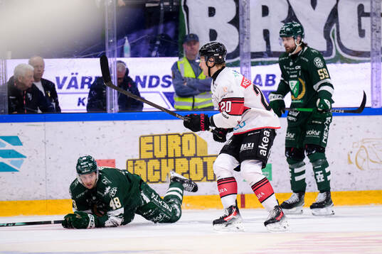 Färjestads Filip Roos och Malmö Redhawks Thomas Berg