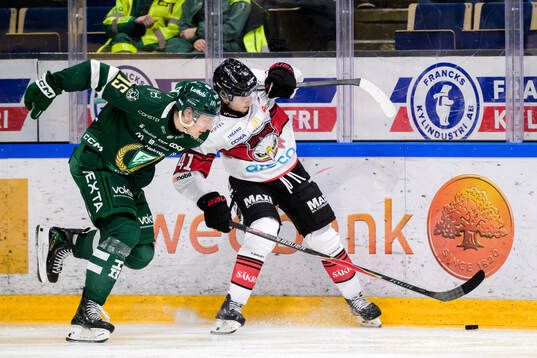 Färjestads Jack Berglund och Malmö Redhawks Isac Born