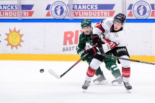 Färjestads Axel Bergkvist och Malmö Redhawks Isac Nilsson