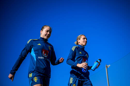 Alice Bergström and Goalkeeper Jennifer Falk of the