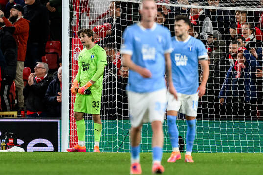 Goalkeeper Melker Ellborg of Malmö FF looks dejected