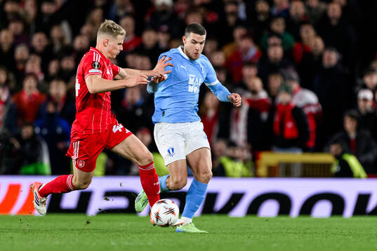 Zach Abbott of Nottingham Forest and Gabriel Busanello of