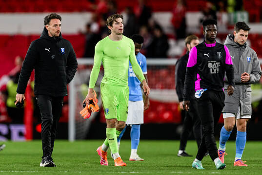Goalkeeper Melker Ellborg of Malmö FF looks dejected