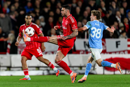 Morato of Nottingham Forest and Hugo Bolin of Malmö FF