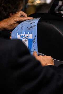 A scarf with autographs