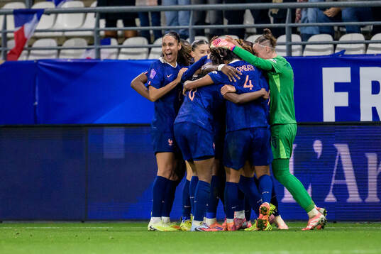 Griedge Mbock Bathy of France celebrate with teammates