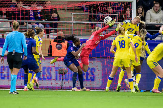 Griedge Mbock Bathy of France scores 2-1 behind goalkeeper