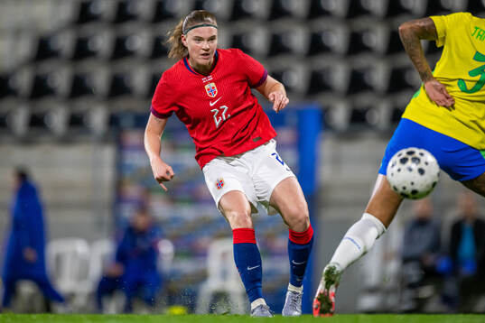 Signe Gaupset of Norway scores the 1-0 goal