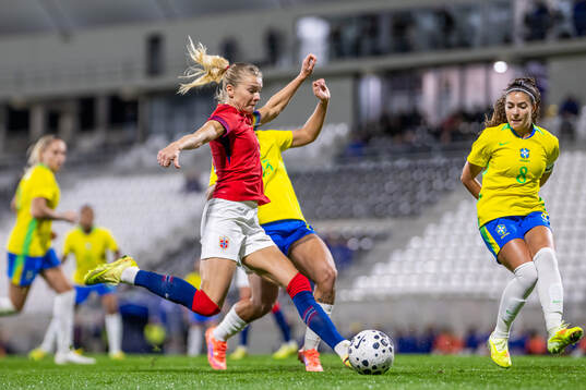 Ada Hegerberg of Norway and Angelina Alonso Costantino of