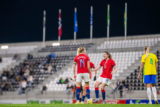 Signe Gaupset of Norway celebrates with teammate Ada