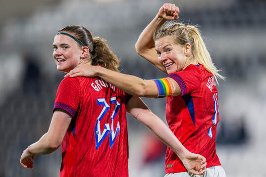 Signe Gaupset of Norway celebrates with teammate Ada