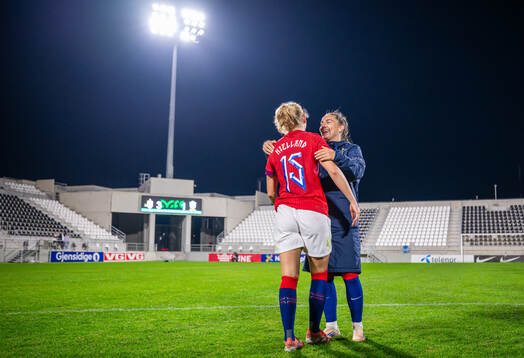 Justine Kielland and Vilde Bøe Risa of Norway celebrate