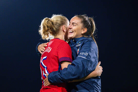Justine Kielland and Vilde Bøe Risa of Norway celebrate
