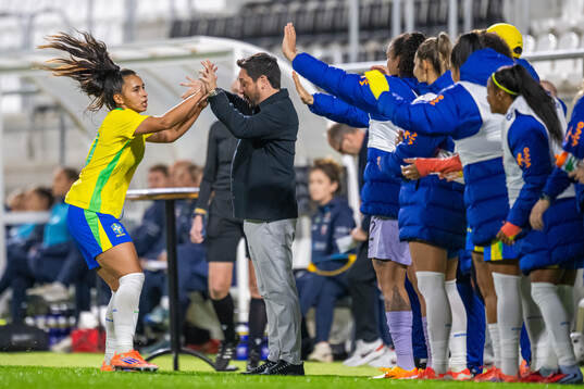 Mariza Nascimento Silva and head coach Arthur Elias of