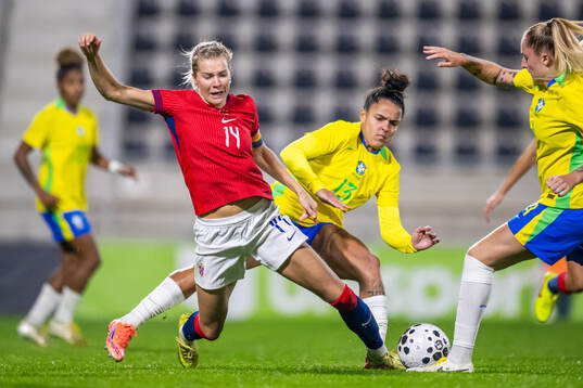 Ada Hegerberg of Norway and Isabela Chagas of Brazil