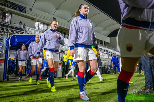 Mathilde Harviken and Signe Gaupset of Norway enter the