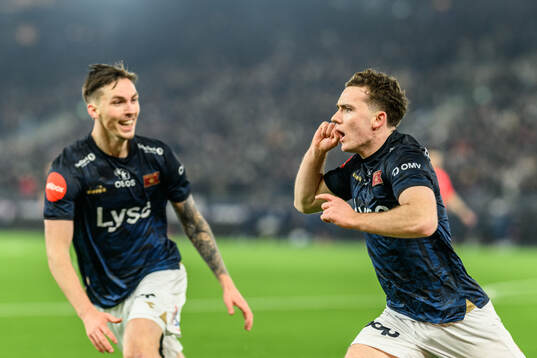 Edvin Austbö of Viking celebrates