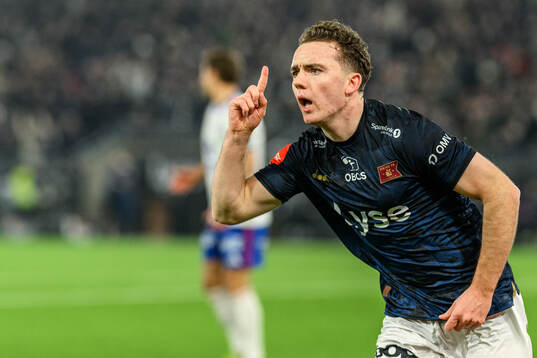 Edvin Austbö of Viking celebrates