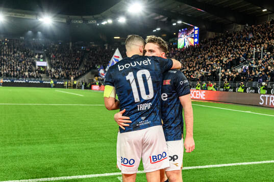 Zlatko Hovland Tripic and Edvin Austbö of Viking celebrate