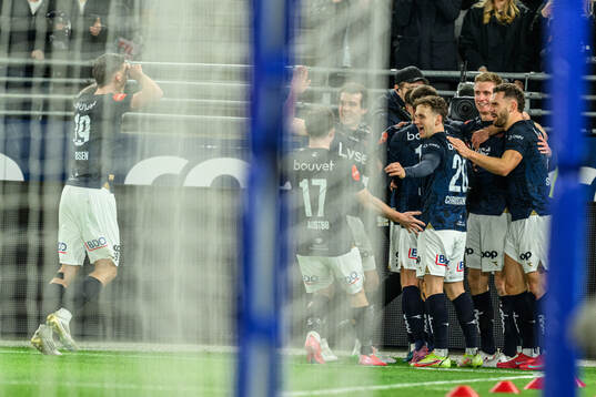 Martin Ove Roseth of Viking celebrate with teammates