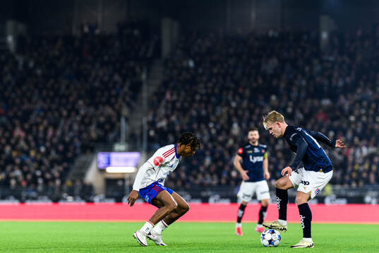 Promise Ikojo Meliga of Vålerenga and Ruben Kristensen