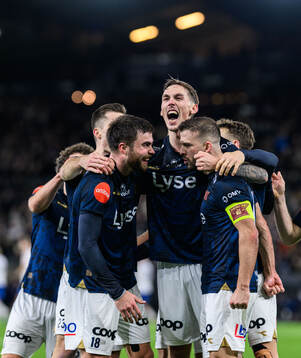 Zlatko Hovland Tripic of Viking celebrates with teammates