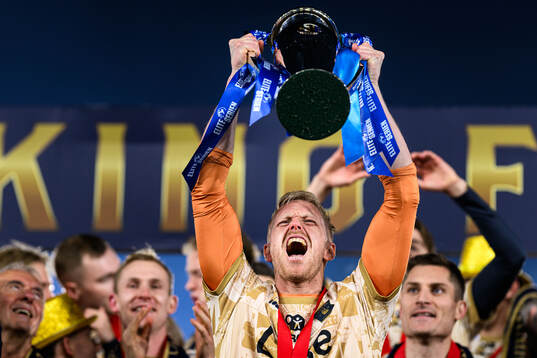 Goalkeeper Arild Östbö of Viking celebrates