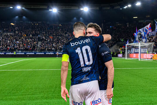 Zlatko Hovland Tripic and Edvin Austbö of Viking celebrate