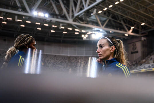 Evelyn Ijeh and Kosovare Asllani of the Swedish women's