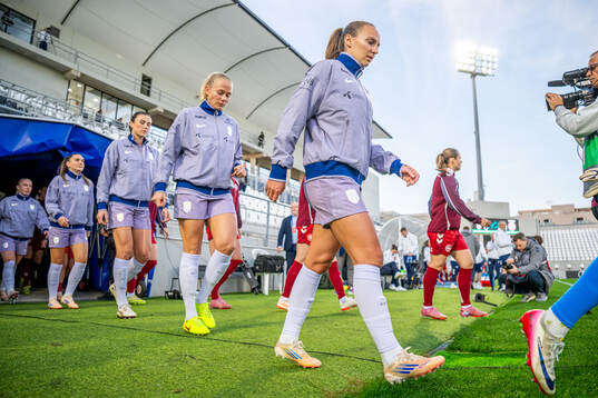 Marit Bratberg Lund of Norway enters the pitch