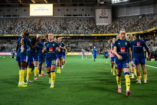 Johanna Rytting Kaneryd and Kosovare Asllani of Sweden