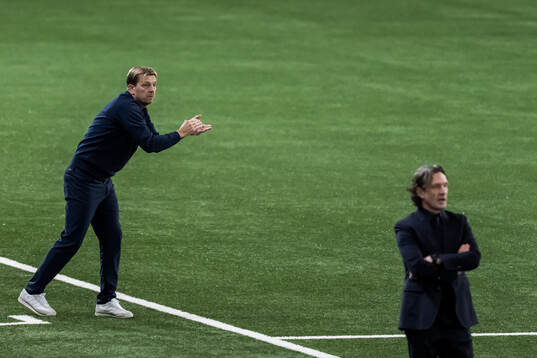 Head coach Tony Gustavsson of Sweden and Head coach Laurent