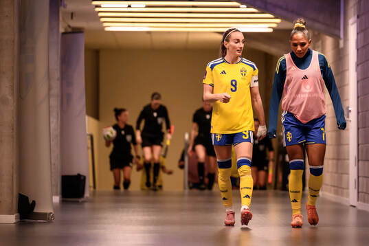 Kosovare Asllani and Madelen Janogy of Sweden
