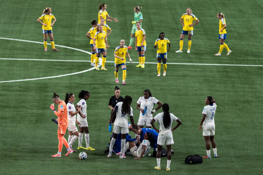 Perle Morroni of France receives medical attention