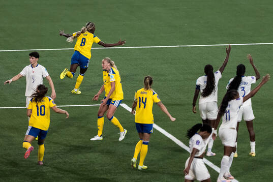 Evelyn Ijeh of Sweden celebrates