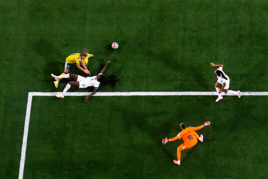 Johanna Rytting Kaneryd of Sweden challenges Griedge Mbock