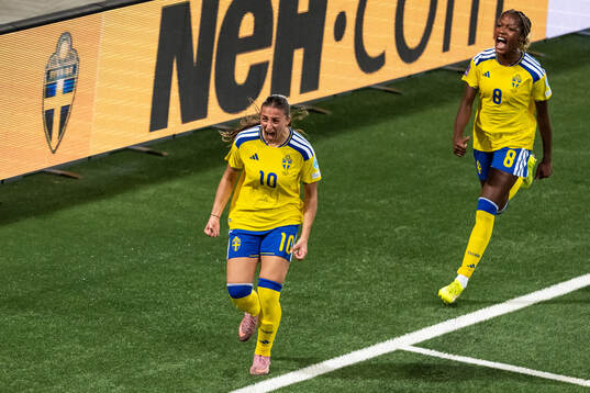 Rosa Kafaji and Evelyn Ijeh of Sweden celebrate the 2-1 goal