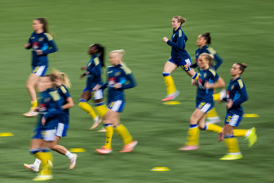 Beata Olsson of Sweden warming up with teammates