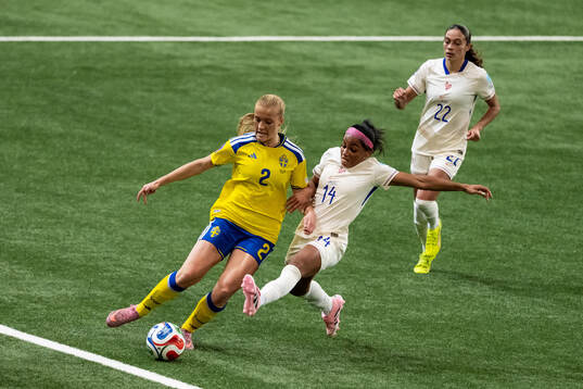 Smilla Holmberg of Sweden is being challenged by Perle