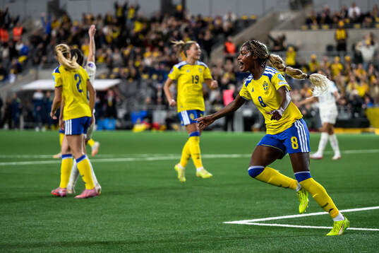 Evelyn Ijeh of Sweden celebrates