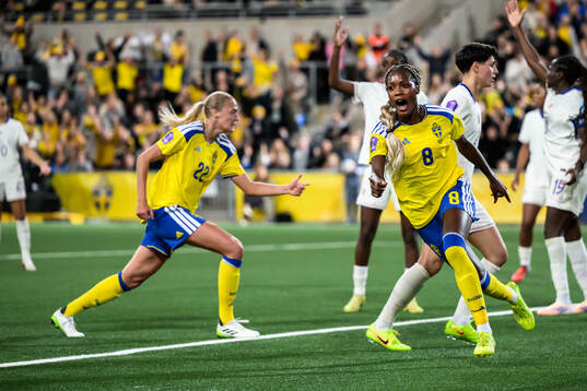 Evelyn Ijeh of Sweden celebrates